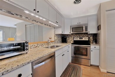 Updated Kitchen, granite counters, tile backsplash