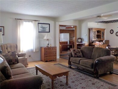 View from front entry into living and dining area