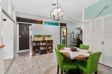 Dining room and entry to guest living areas.