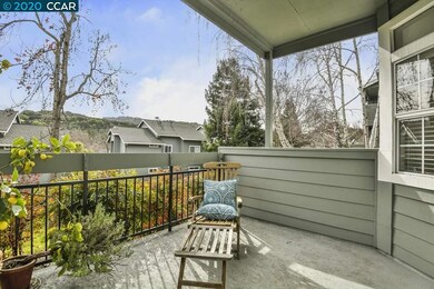 2 Decks overlook open space between buildings and has storage area