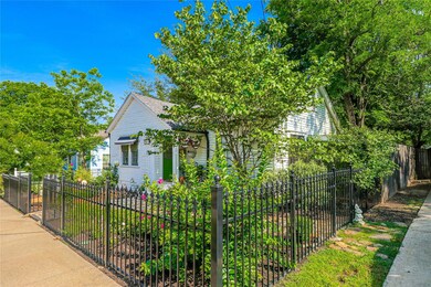 Iron Fence with Two Gates _ Stone Walkway to Front