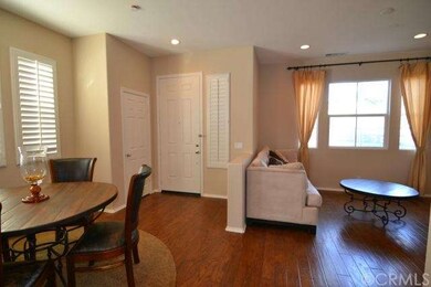 View of dining area and living room towards the fr