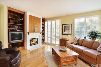 Family Room with Beautiful Wood Floors, Cozy Firep