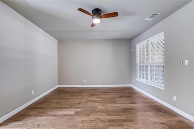 Spare room with plenty of natural light, a ceilin