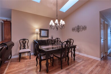 Enjoy the dining space, complete with vaulted ceil
