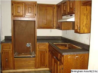 View of kitchen with newer cabinets