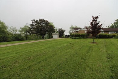 Front yard with driveway.