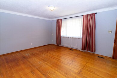 Wood floors and coved ceiling in the living room