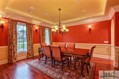 Handsome Dining Room with Custom Millwork and Love