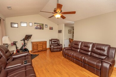 Open to dining area, kitchen & hall