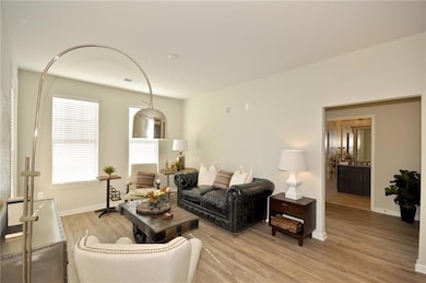 Living room featuring light wood-type flooring