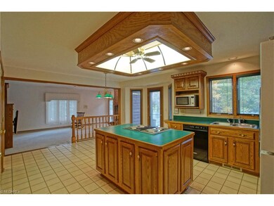 Open Eat in Kitchen with stove built into the isla