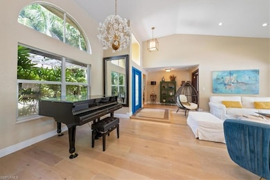 Miscellaneous room featuring a notable chandelier,