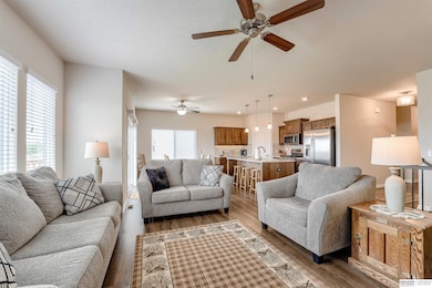Living room looking towards kitchen and informal dining area.