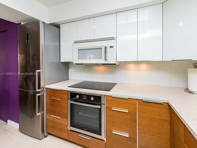 Modern kitchen features Fagor European stainless s
