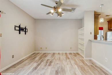 This is a charming townhouse with a brick exterior