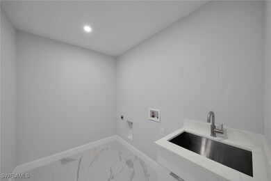 1102 Santa Barbara Blvd N, Cape Coral, FL 33993 - photo 6