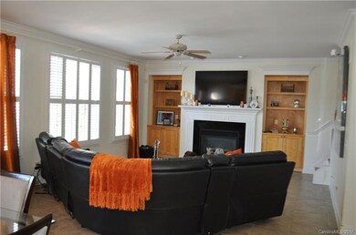 Family Room includes fireplace and built-ins