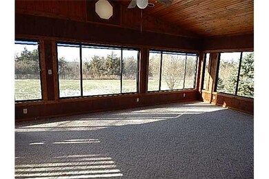 Other. enclosed lower level porch