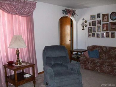 Living Room. View of living room looking toward fr