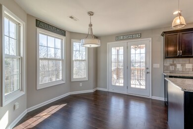 Kitchen features natural lighting.