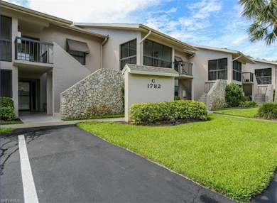 1782 Imperial Golf Course Blvd unit C-104, Naples, FL 34110 - photo 2
