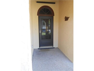 Exterior Front. covered porch entry leads to large