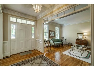 Warm and welcoming with hardwood floors,  front do