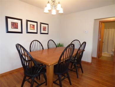 Dining area with hardwood floors