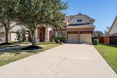 3 car tandem garage. Tons of driveway space for ex