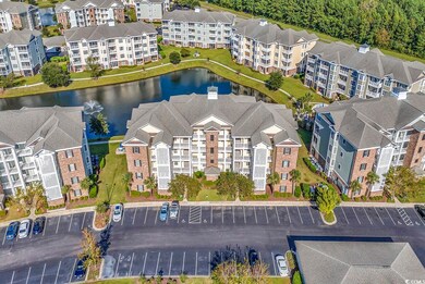 Top view of building showing pond in the behind th