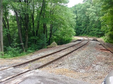 RR tracks border acreage for a while- see tax map-