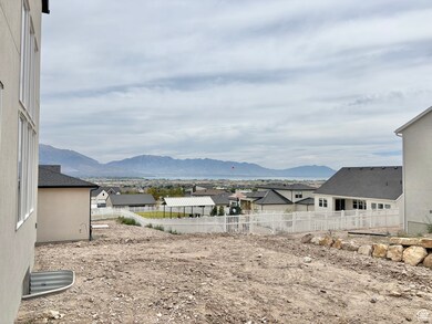 View of yard featuring a residential view and a mountain view