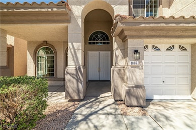 Entrance to property featuring stucco siding