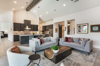  Architecturally pleasing high vaulted beamed ceiling!