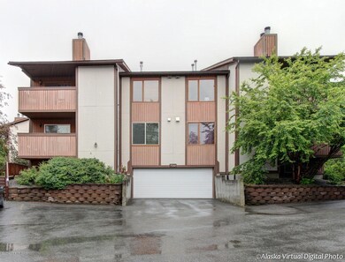 Front of building w/tuck under garage
