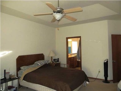 master bedroom with walk in closet