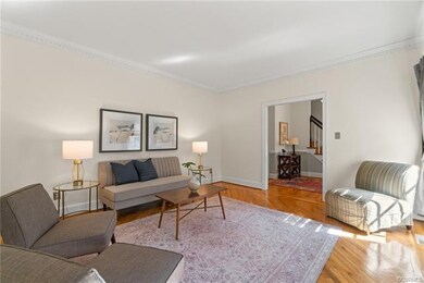 The formal living room with hardwood floors.