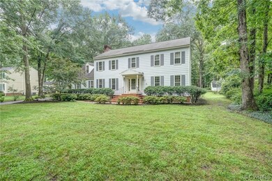 This pretty home sits on a flat, semi-private lot