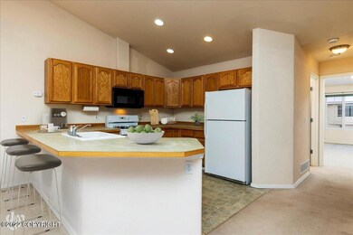 Spacious Kitchen with bkf bar