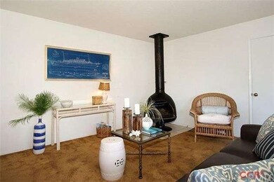 Cozy living room open to kitchen and dining