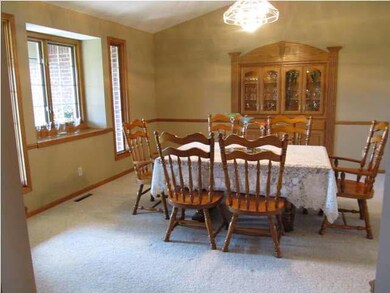 Large formal dining room with custom built in hutc