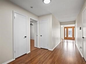 Hall with wood floors.