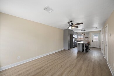 The open-concept main floor seamlessly connects to
