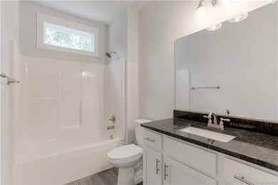 Hall Bath w/Ceramic Tile, Vanity & Tub Shower.