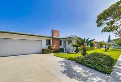 Garage front of home with concrete drive