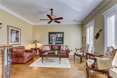 Formal living room accented by designer paint, cro