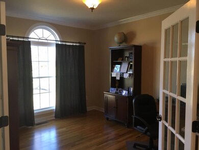 Spacious home office with French Doors. 