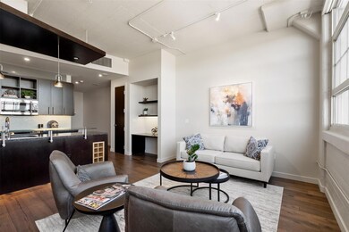 Living room featuring dark hardwood / wood-style f