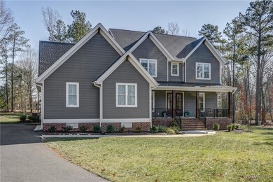 Front side view of house from the driveway pulling